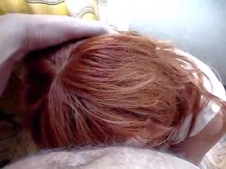 Pleasant redhead on her knees sucking prick and balls film