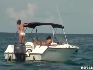 Naughty girls lustful threesome on a boat